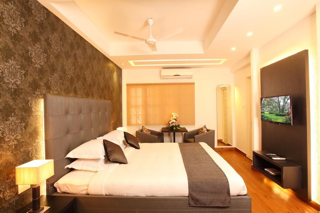 Hotel Luciya Palace Thrissur Værelse billede