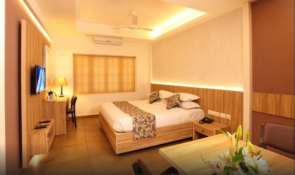 Hotel Luciya Palace Thrissur Værelse billede